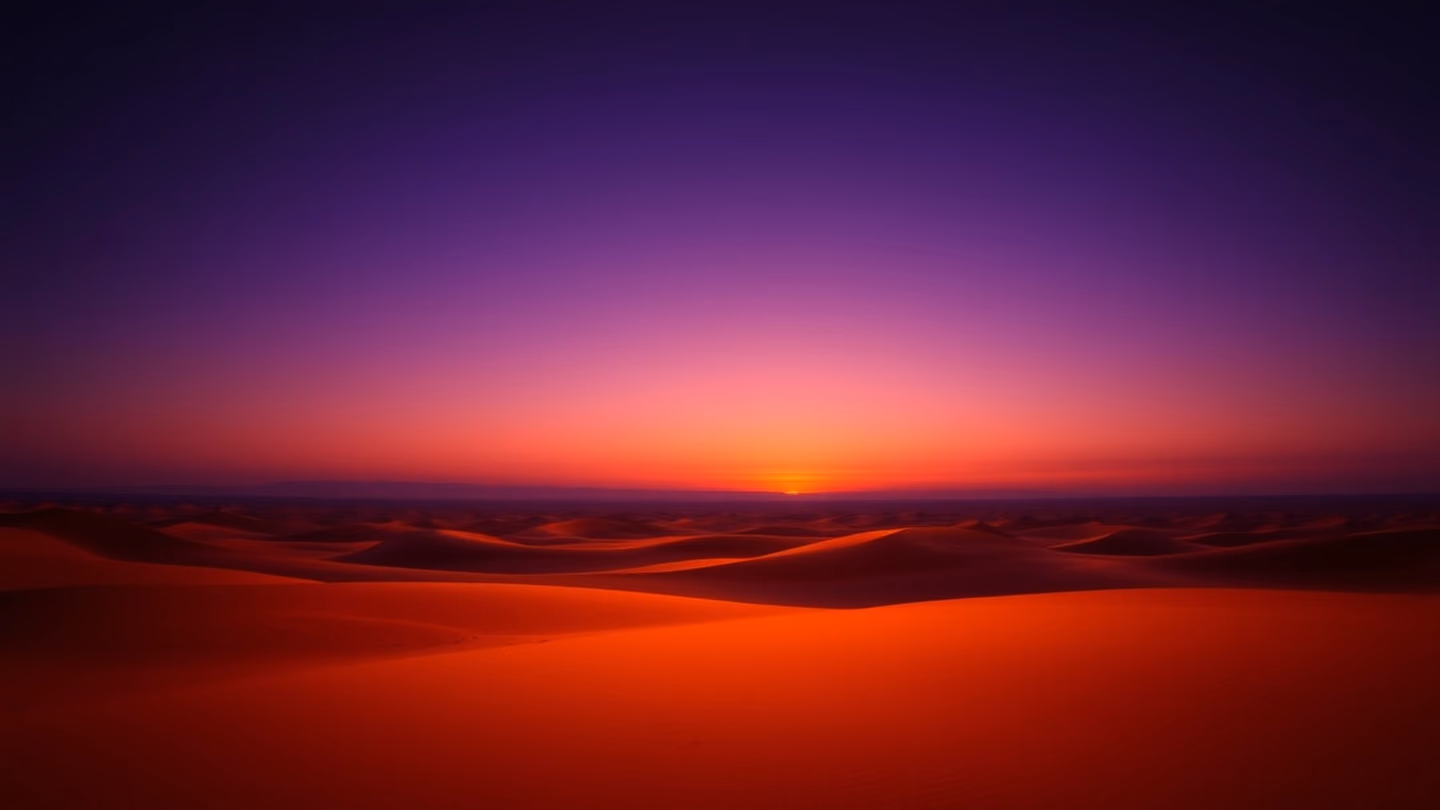 A vast desert horizon at twilight, where the earth meets the sky in a seamless gradient of deep violet and gold, peaceful and infinite.