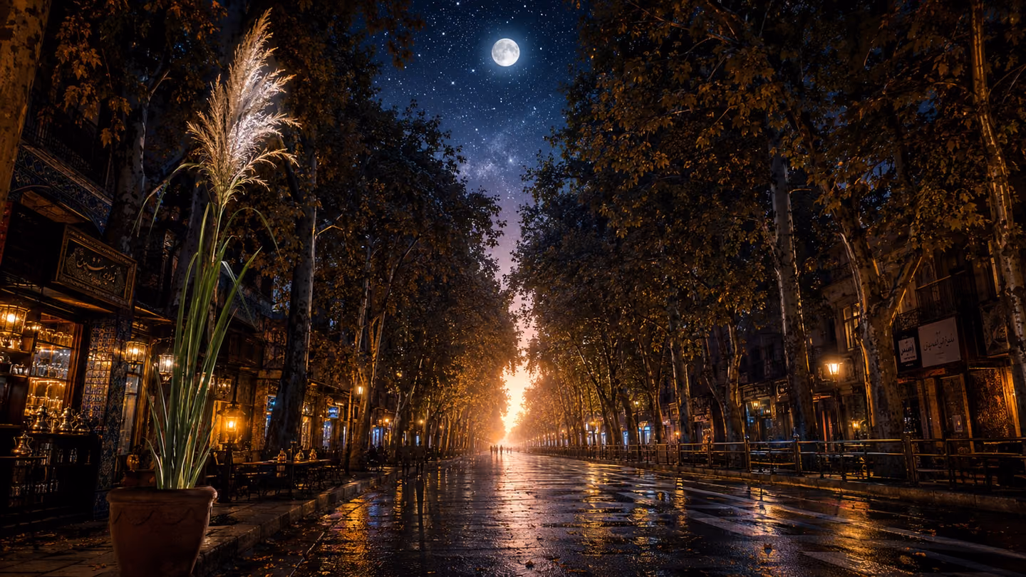 A long wide view down Valiasr Avenue's plane-tree canopy — the only wide frame — at the exact moment before dawn: the sky above the tunnel of branches shifts from deep star-blazing blue-black to a luminous pale silver…