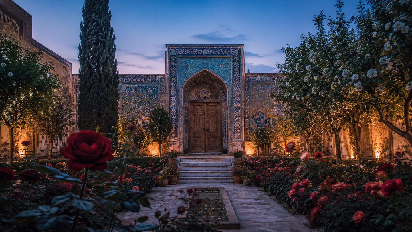 Cool blue dawn over an enclosed Shiraz rose-garden courtyard — crimson and blush rose beds, a tall dark cypress, orange-blossom trees, and at one end an old carved wooden door set in an arch of turquoise-and-cobalt ti…