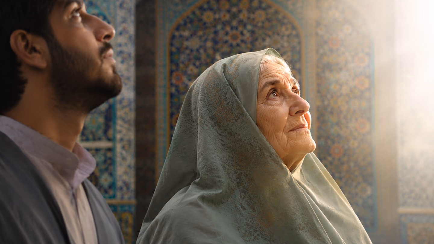 The upturned face of an elderly Iranian woman in a pale sage chador, eyes open and shining, turned toward a pure white radiance pouring in from off-frame — no figure there, only light.